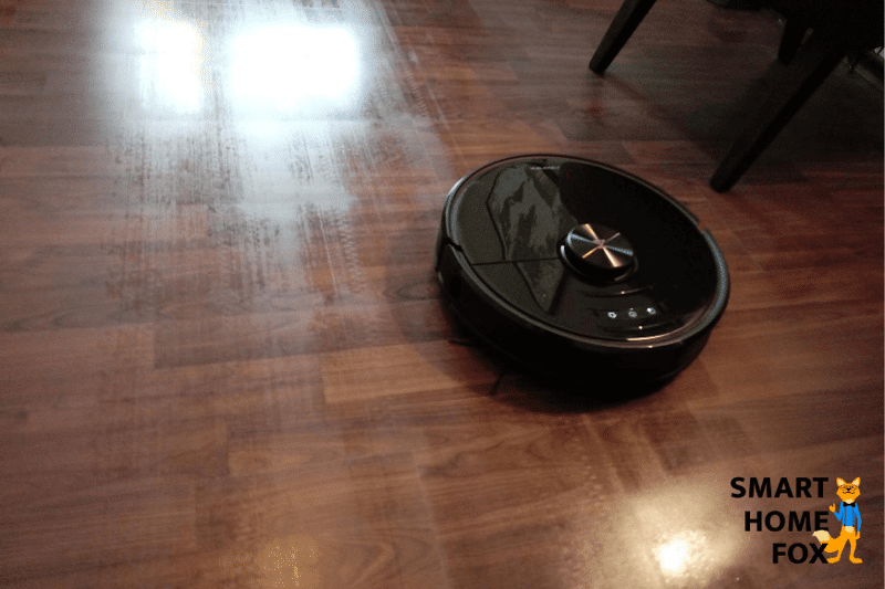 Roborock S6 MaxV mops the floor in the study.
